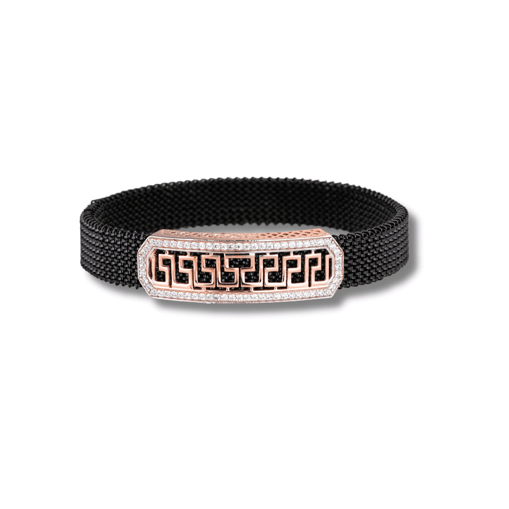 Black mesh bracelet with a rose gold and silver clasp on a white background