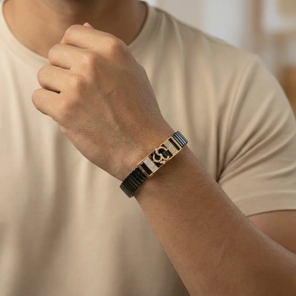 Person wearing a bracelet with a neutral background