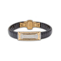 Bracelet with black ceramic and rose gold metal design on a white background