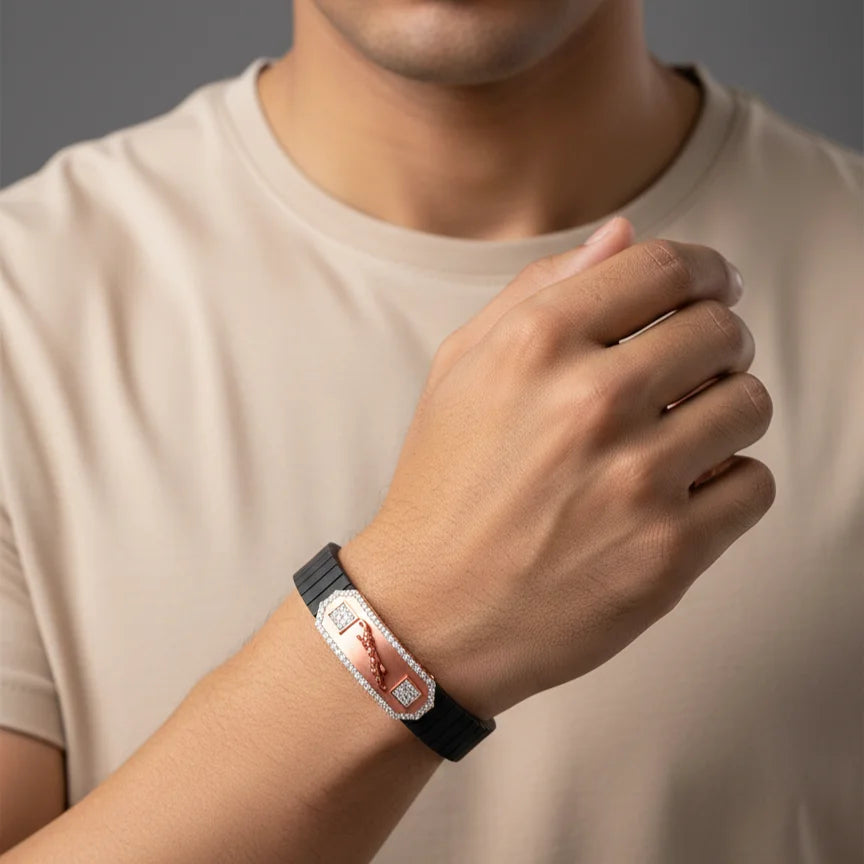 Person wearing a black smartwatch on a plain background