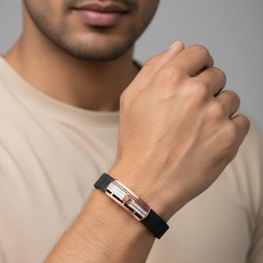 Rose gold perforated bar men’s imitation bracelet with black band and emblem detail