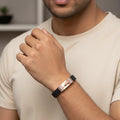 Rose gold symbol men’s imitation bracelet worn on wrist